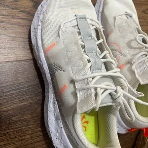 Like New. White Nikes Mesh upper. Worn once